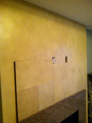 Little faux finish, with sample board leaning against wall, to show match.